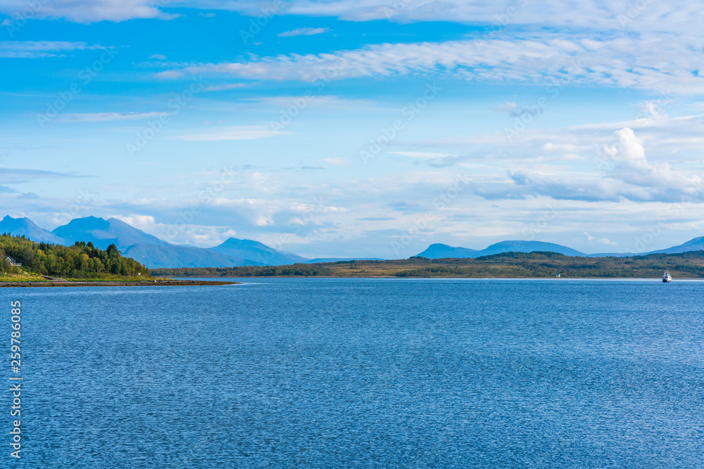View of the Sandnessundet strait from Hakoya - the 3.69-square-kilometre island located between the islands Kvaloya and Tromsoya in Troms county, Norway.