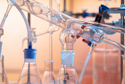 Glass instruments in the laboratory of chemical synthesis photo