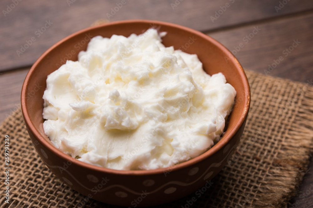 Homemade white Butter or Makhan/Makkhan in Hindi, served in a bowl. selective focus Homemade white Butter or Makhan/Makkhan in Hindi, served in a bowl. selective focus