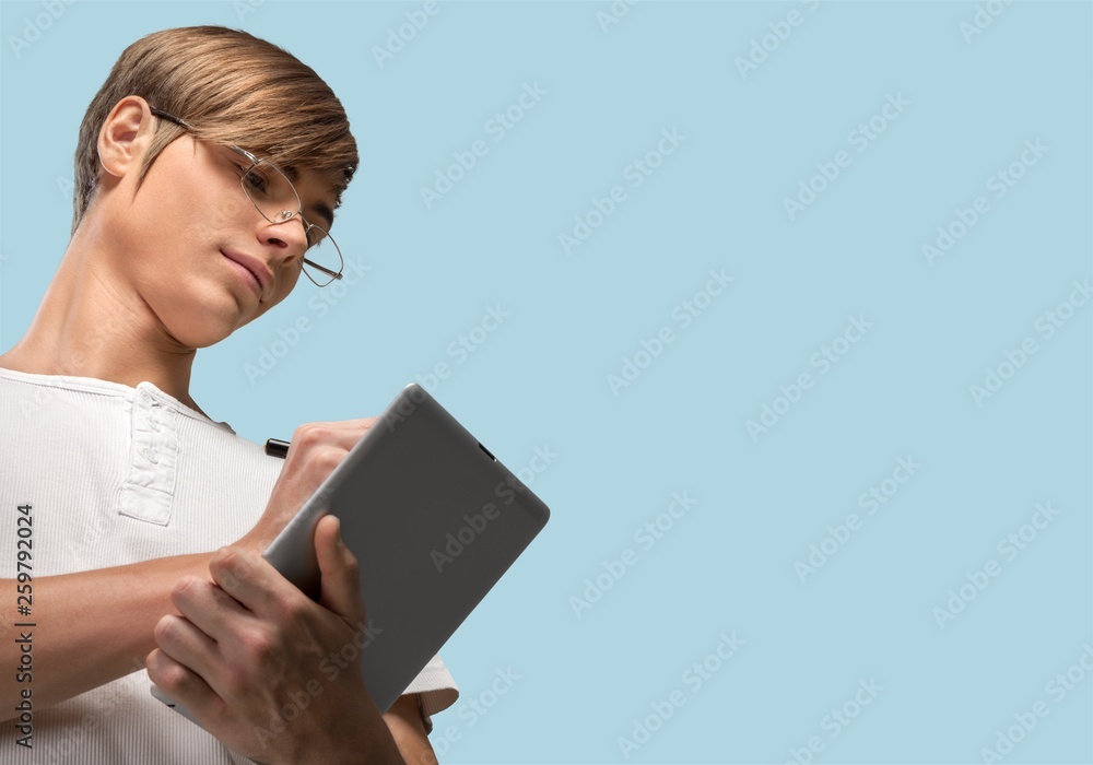Male hands holding and using laptop Male hands holding and using laptop