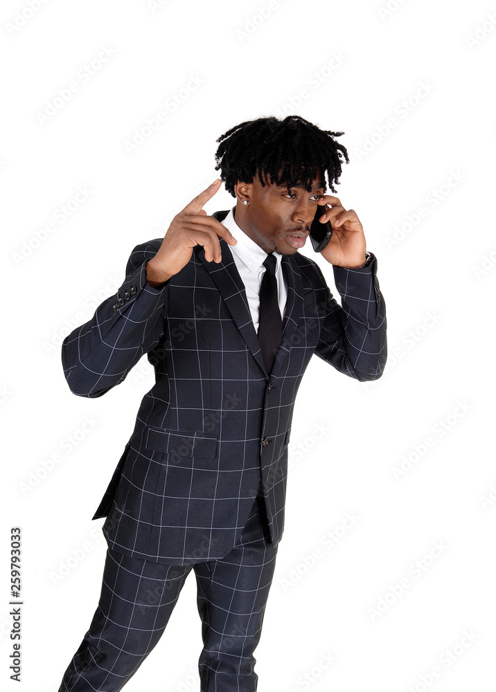 African American business man on the phone African American business man on the phone