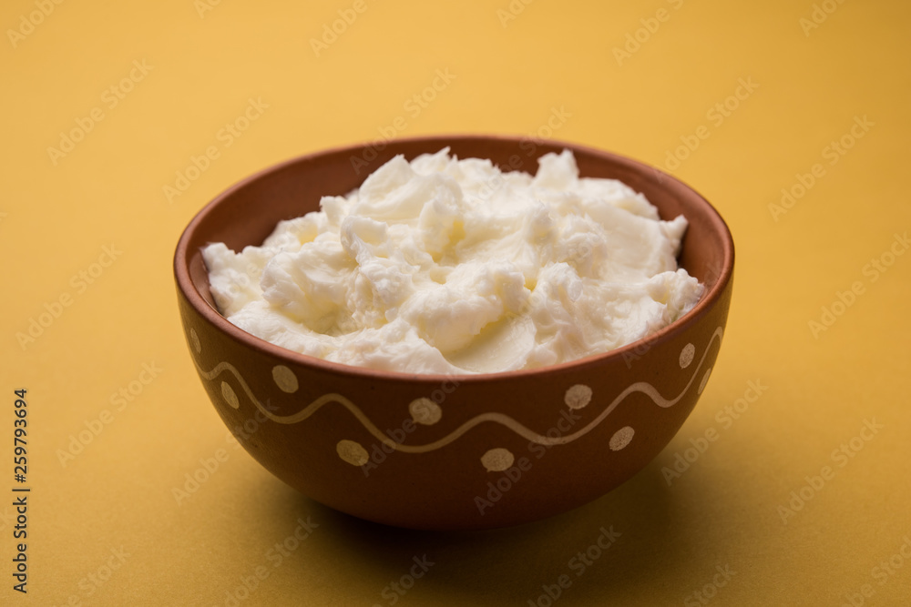 Homemade white Butter or Makhan/Makkhan in Hindi, served in a bowl. selective focus Homemade white Butter or Makhan/Makkhan in Hindi, served in a bowl. selective focus