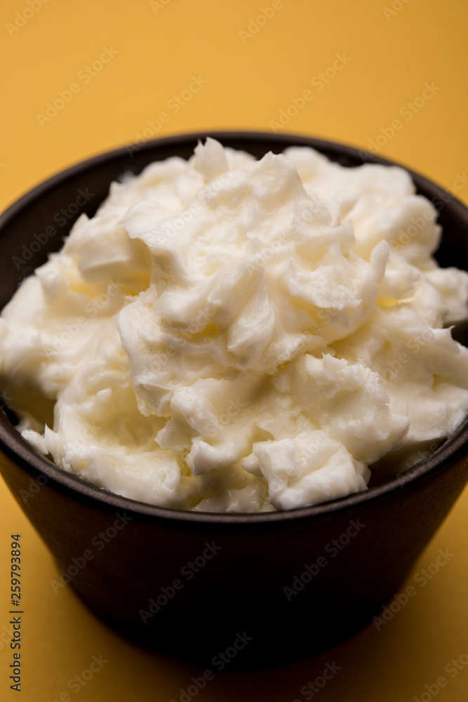 Homemade white Butter or Makhan/Makkhan in Hindi, served in a bowl. selective focus Homemade white Butter or Makhan/Makkhan in Hindi, served in a bowl. selective focus