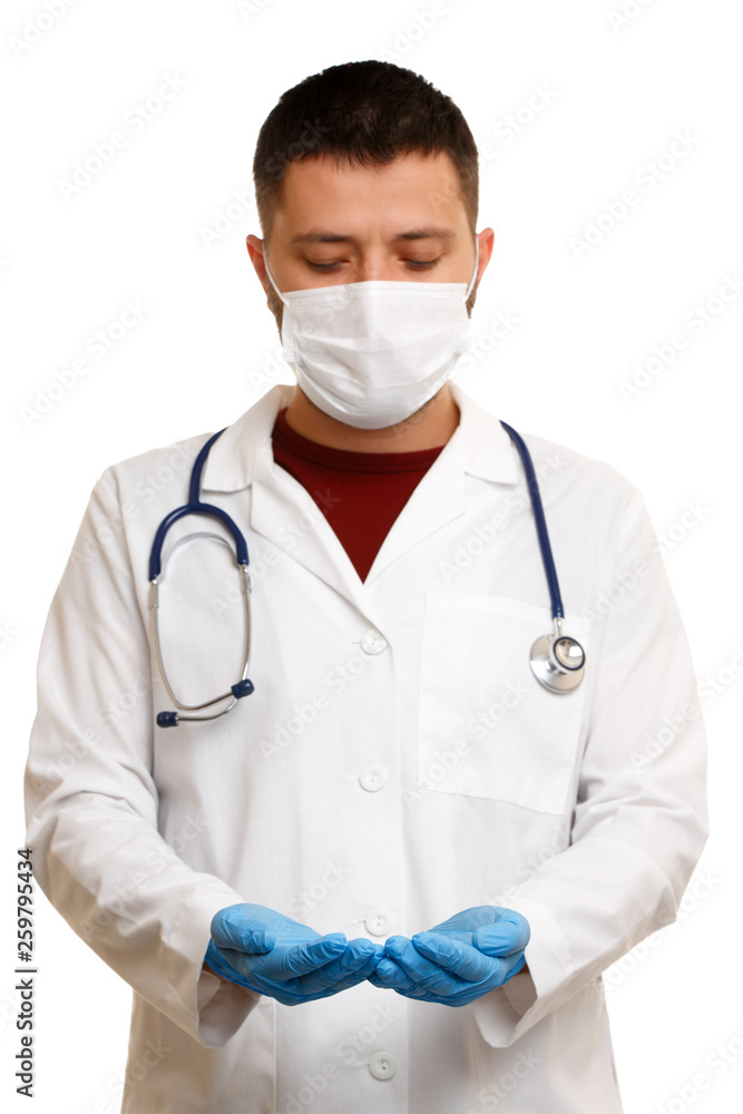 Photo of doctor in mask and white coat with phonendoscope with palms raised up. Photo of doctor in mask and white coat with phonendoscope with palms raised up.