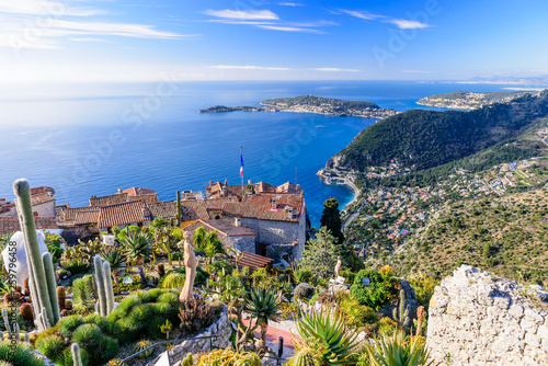 Scenic view of the Mediterranean coastline and medieval houses from the top of the town of Eze village on the French Riviera
