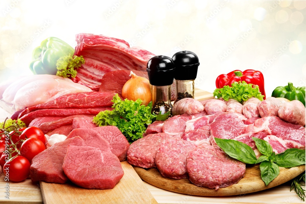 Fresh Raw Meat Background with vegetables Fresh Raw Meat Background with vegetables
