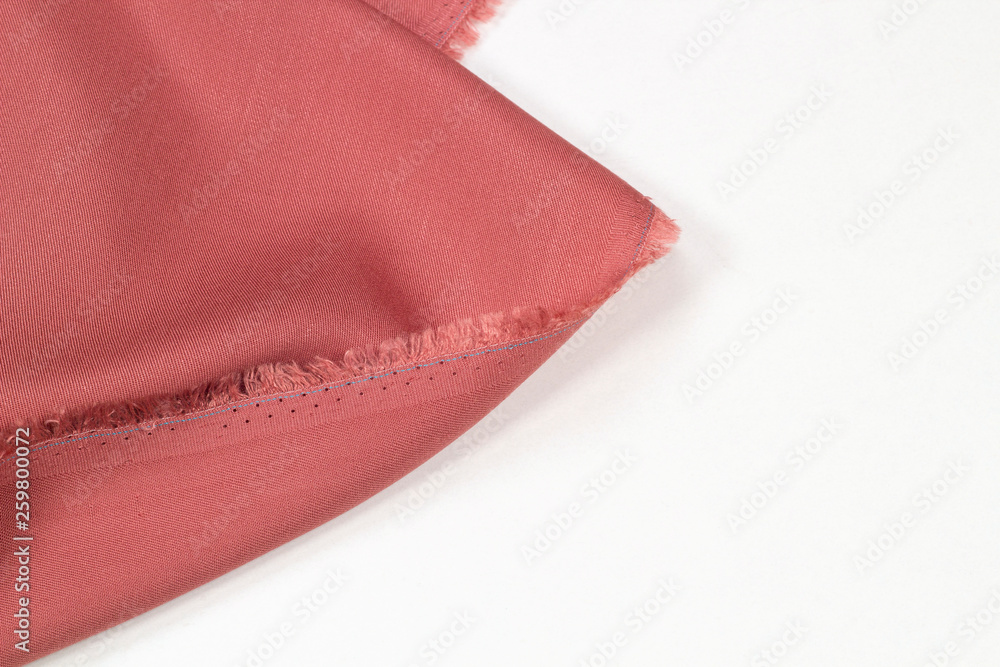 Fabric suit coral folded pleats on white background. Fabric suit coral folded pleats on white background.