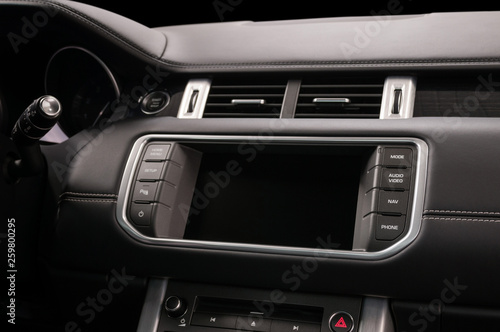 Modern auto panel with screen. Interior detail. © alexdemeshko