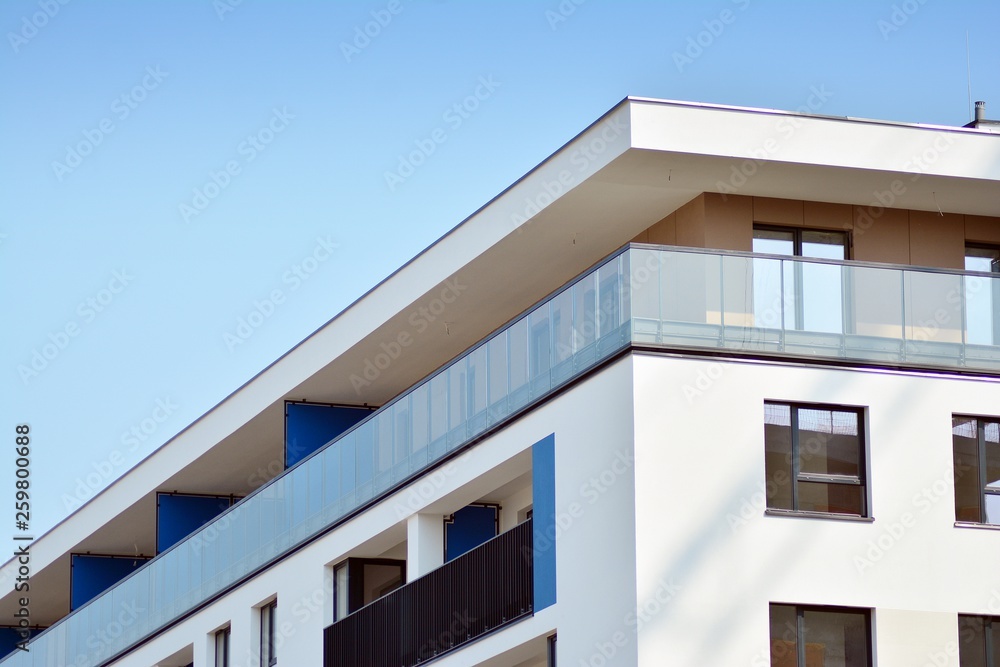 European modern residential architecture. Fragment of a modern apartment building in front. Very modern apartment house. European modern residential architecture. Fragment of a modern apartment building in front. Very modern apartment house.