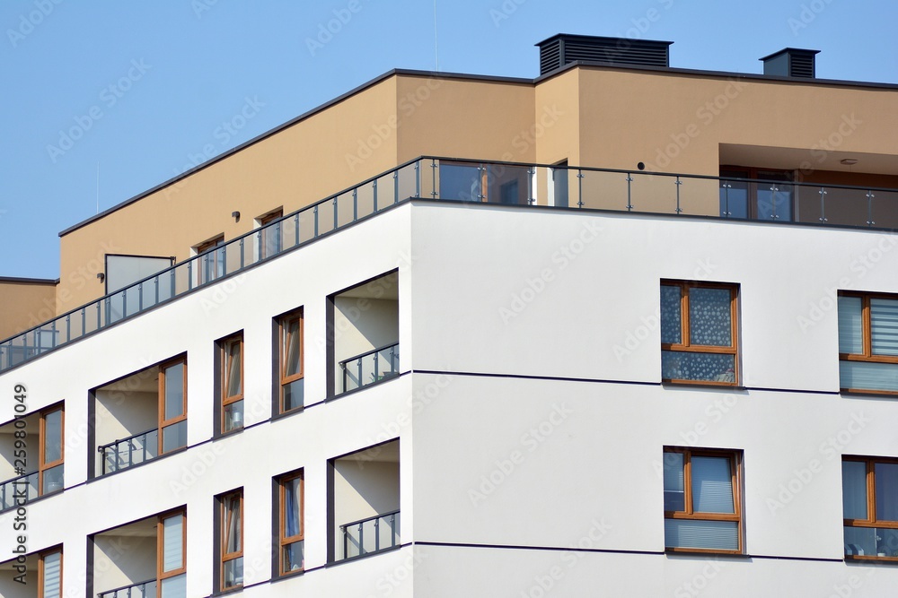 European modern residential architecture. Fragment of a modern apartment building in front. Very modern apartment house. European modern residential architecture. Fragment of a modern apartment building in front. Very modern apartment house.