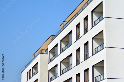 European modern residential architecture. Fragment of a modern apartment building in front. Very modern apartment house. 