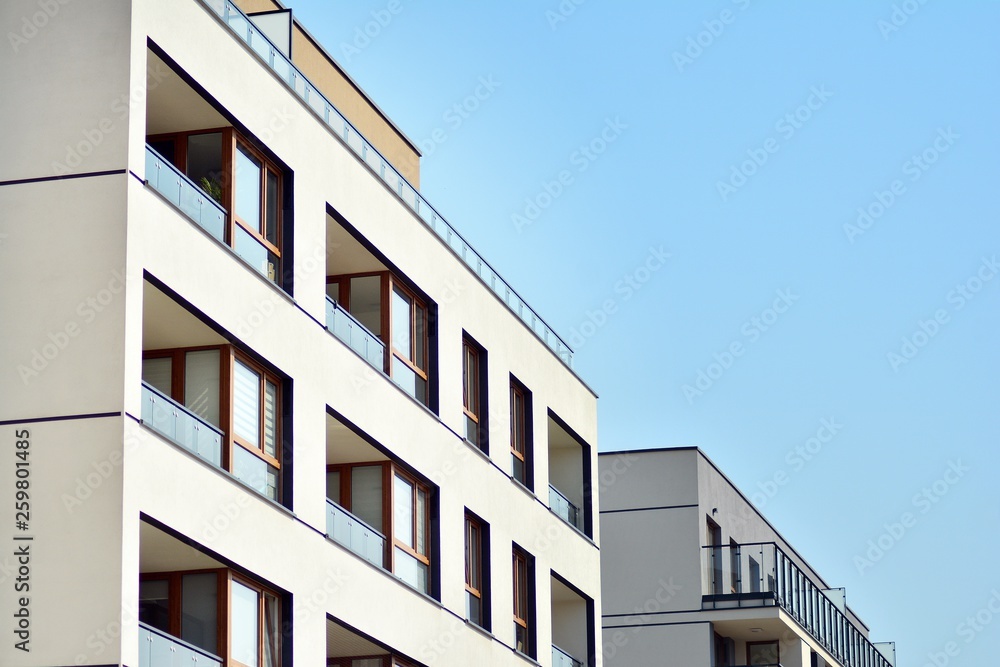 European modern residential architecture. Fragment of a modern apartment building in front. Very modern apartment house. 