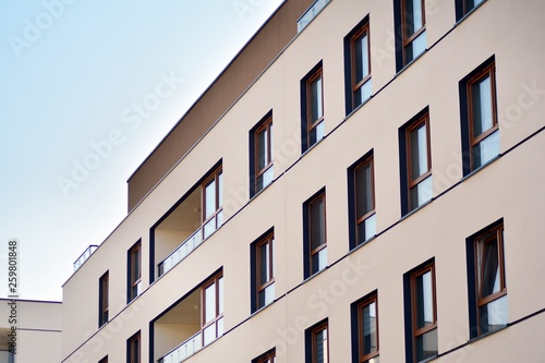 European modern residential architecture. Fragment of a modern apartment building in front. Very modern apartment house.  © Grand Warszawski