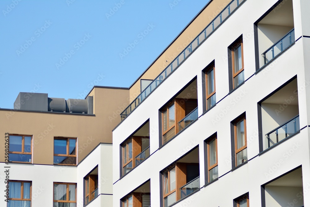 European modern residential architecture. Fragment of a modern apartment building in front. Very modern apartment house. European modern residential architecture. Fragment of a modern apartment building in front. Very modern apartment house.