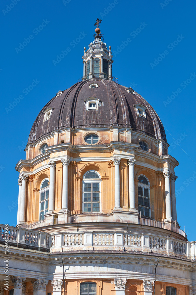 Superga, baroque basilica dome on Turin hills in a sunny summer day, clear blue sky in Italy