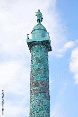 Place Vendome column in summer, cloudy sky in Paris, France