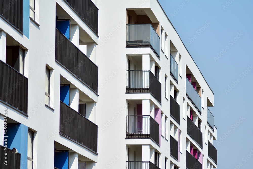 European modern residential architecture. Fragment of a modern apartment building in front. Very modern apartment house. 