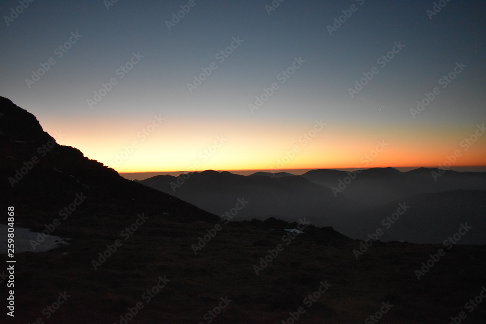 Sunrise on behind mountains