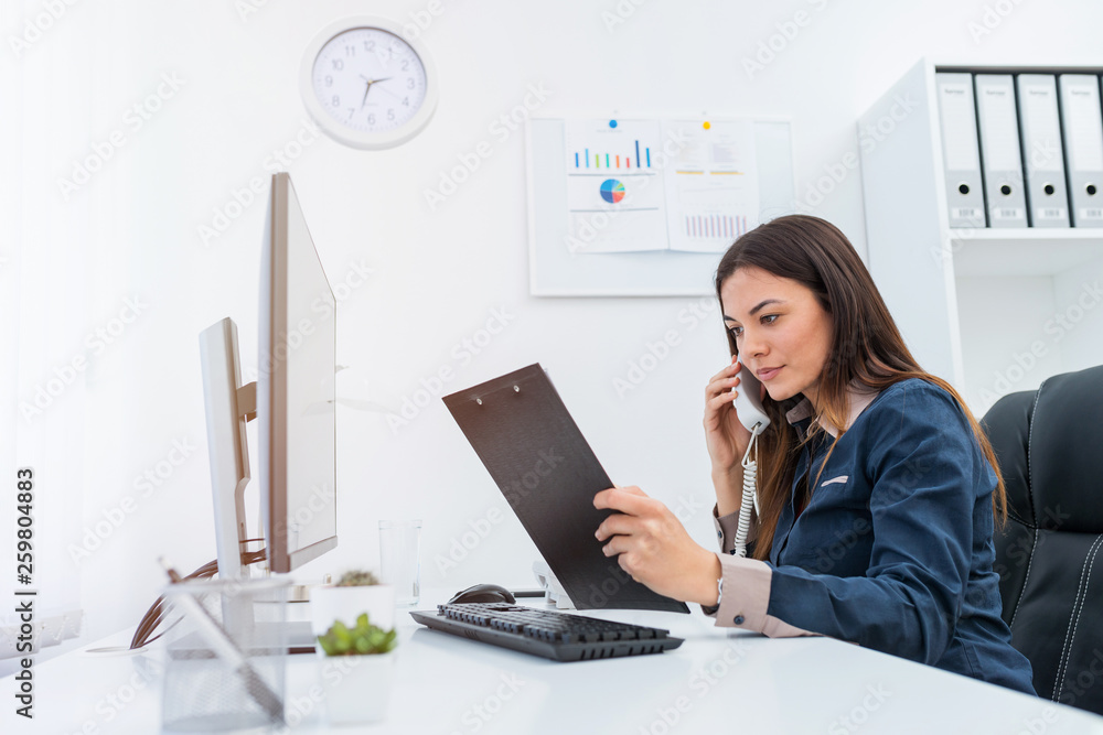 Young female professional on a phone meeting Young female professional on a phone meeting