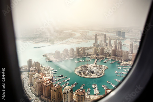 Doha, the capital of the state of Qatar. View from the airplane window. photo