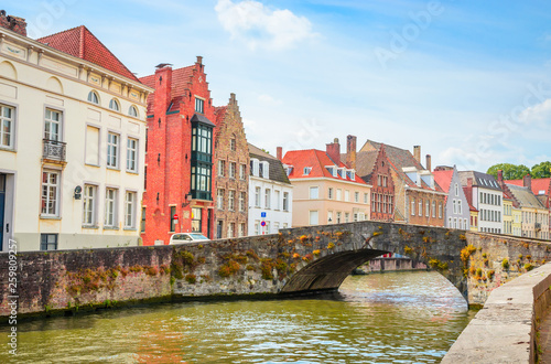 Beautiful canal and traditional houses in the old town of Bruges (Brugge), Belgium