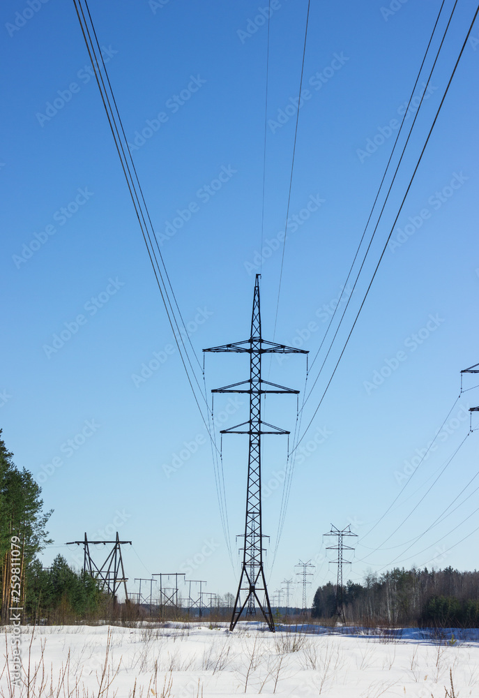 Powerful line of electricity costing on a background of blue sky