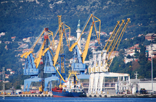 Terminal of Trieste and cranes in the port, Italy