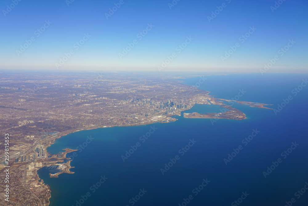 Aerial landscape view of the city of Toronto skyline and Lake Ontario in Ontario, Canada Aerial landscape view of the city of Toronto skyline and Lake Ontario in Ontario, Canada