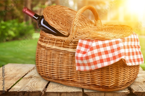 Picnic Basket with napkin om nature background