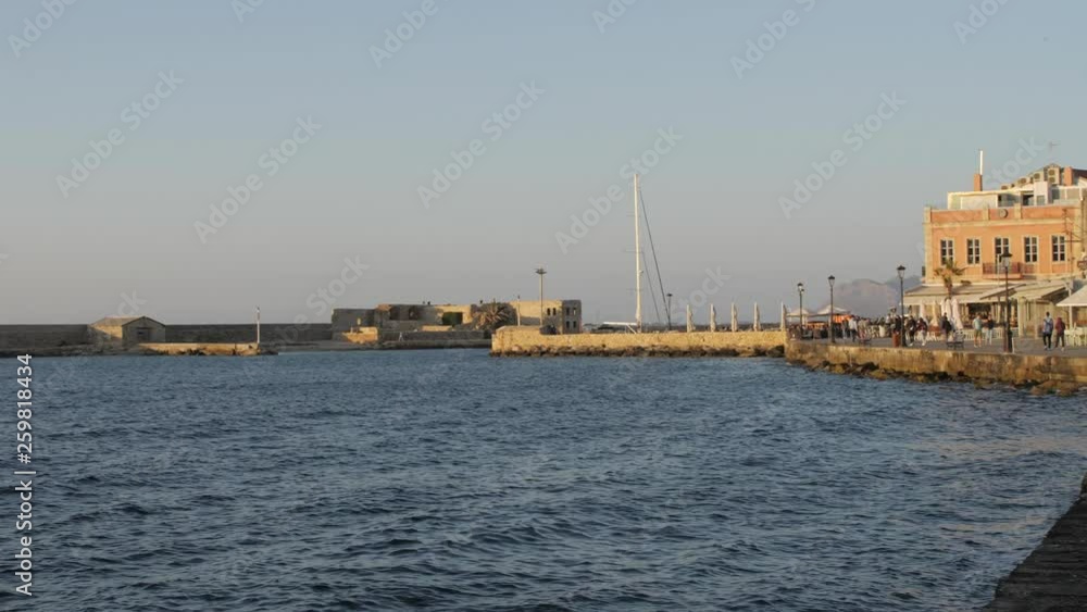 The Venetian era harbour and lighthouse at the Mediterranean port of Chania, Crete The Venetian era harbour and lighthouse at the Mediterranean port of Chania, Crete