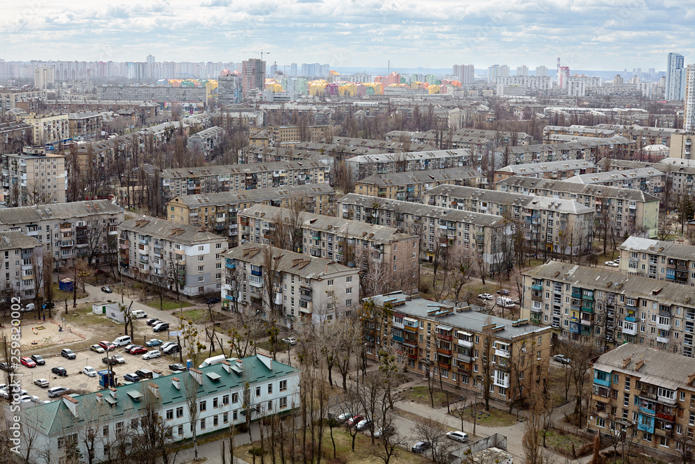 The aerial View of urban residential district.View over the city rooftops with sunlight.Moderns buildings at Industrial uptown,residential neighbourhood/Beautiful cityscape
