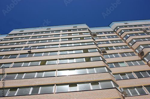 High-rise residential building, the front of the building, the exterior of an apartment building, urban housing