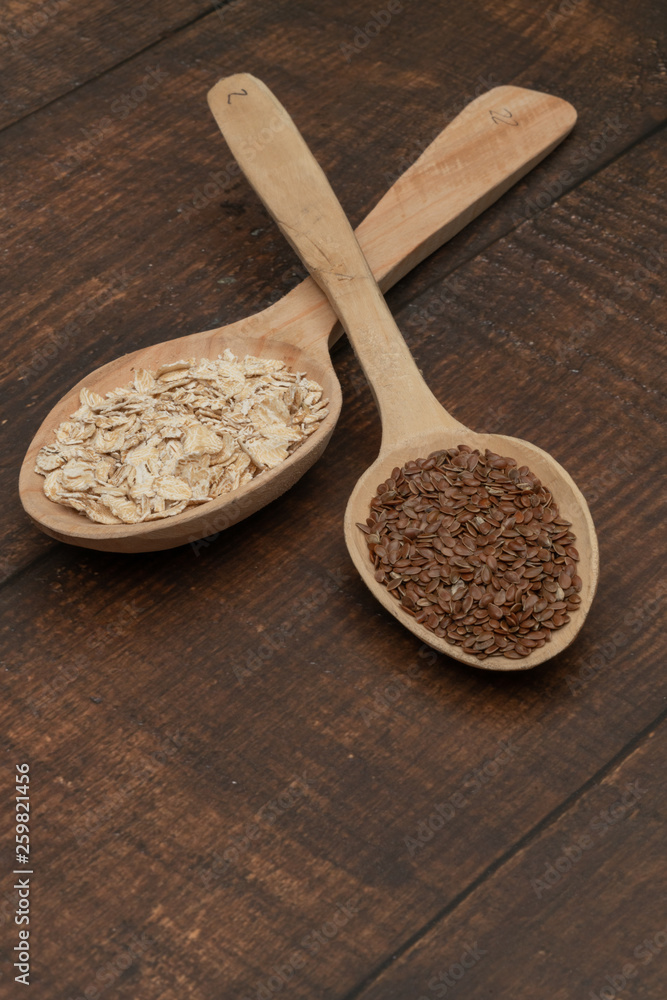Seeds on a wooden spoon close up Seeds on a wooden spoon close up