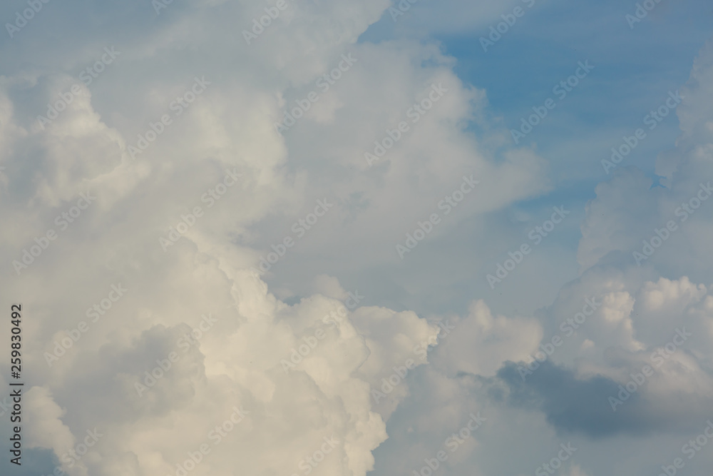 fluffy white cloud above clear blue sky background fluffy white cloud above clear blue sky background