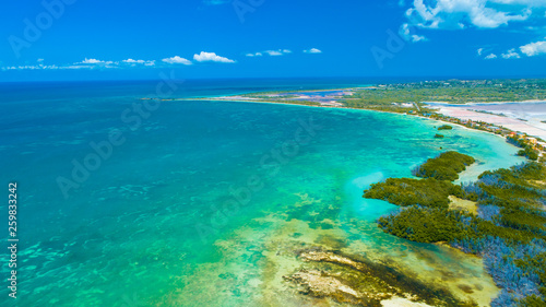 Aerial view of Puerto Rico. Faro Los Morrillos de Cabo Rojo. Playa Sucia beach and Salt lakes in Punta Jaguey. 