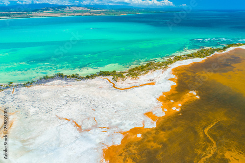 Aerial view of Puerto Rico. Faro Los Morrillos de Cabo Rojo. Playa Sucia beach and Salt lakes in Punta Jaguey.  photo