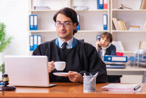 Two lawyers working in the office © Elnur