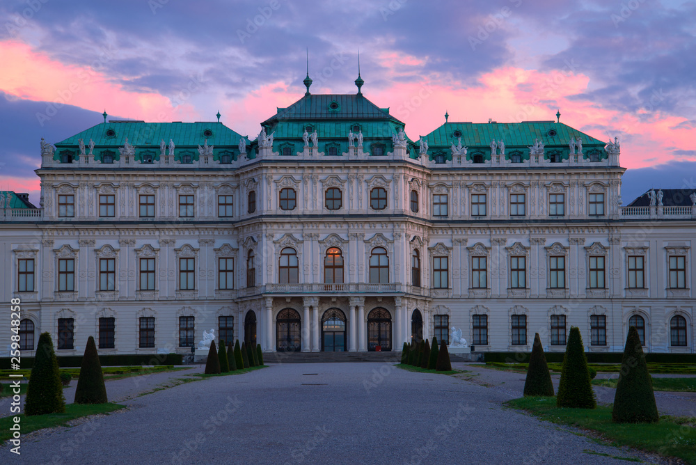 Facade of the Belvedere Palace against the backdrop of the April sunset. Vienna, Austria