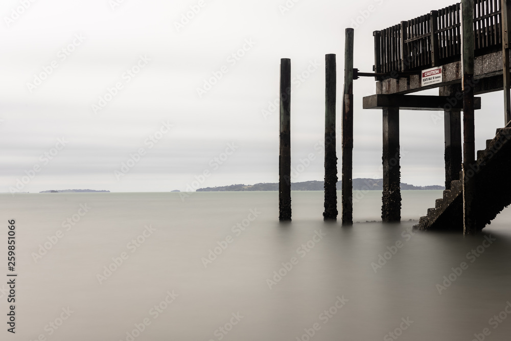 Coastal pier on cloudy day
