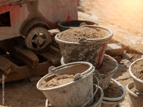 sand material in the bucket in construction site