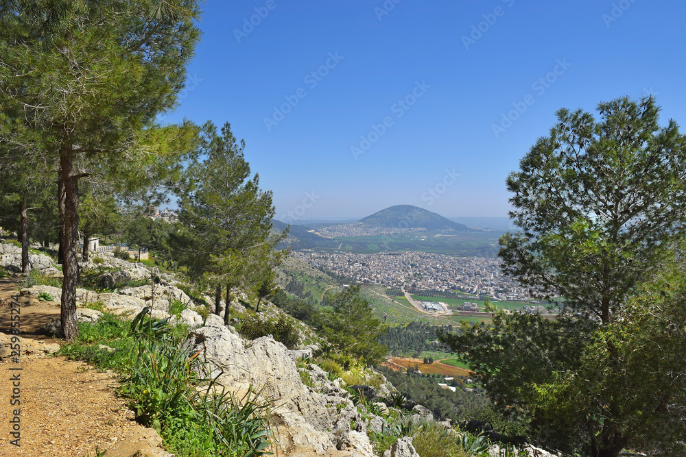 view of the Jezreel Valley, biblical Mount Tabor and the Arab villages at its foot, neighborhood Nazareth, Israel view of the Jezreel Valley, biblical Mount Tabor and the Arab villages at its foot, neighborhood Nazareth, Israel
