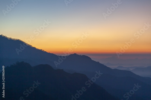 Majestic sunset in the mountains landscape with sunny beams. Dramatic scene. Sri Lanka Ella © olezzo