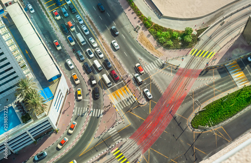 Photography cars in city intersection, aerial view. Dubai