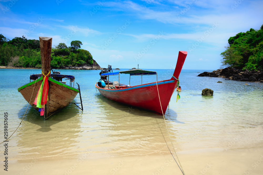 Boats in beautiful sea beach with bright blue sky at Ranong ,Thailand Boats in beautiful sea beach with bright blue sky at Ranong ,Thailand