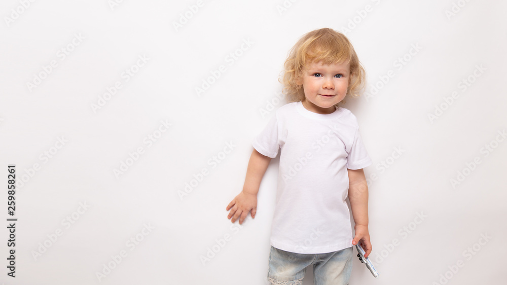 banner child playing with toy airplane against on a white background. concept dreams of flight banner child playing with toy airplane against on a white background. concept dreams of flight
