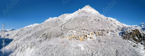 Primolo - Valmalenco (IT) - Vista aerea invernale con neve fresca photo