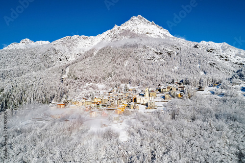 Primolo - Valmalenco (IT) - Vista aerea invernale con neve fresca  photo