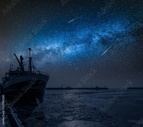 Ship on a frozen sea in win...