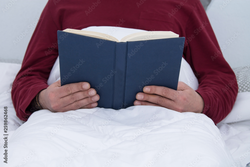 man reading or studying a book man reading or studying a book