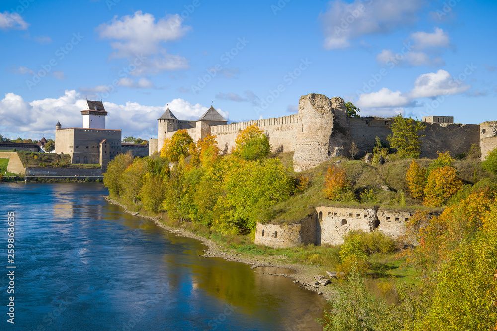 View of the Herman castle and Ivangorod fortress in the golden autumn. Border of Russia and Estonia